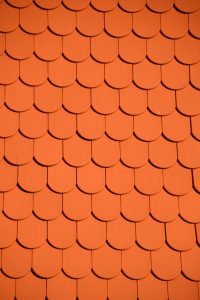 Orange scalloped roof tiles