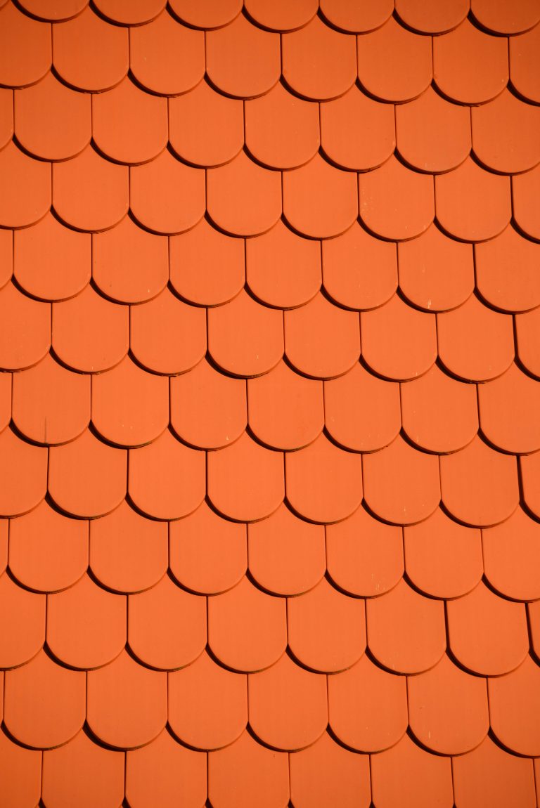 Orange scalloped roof tiles