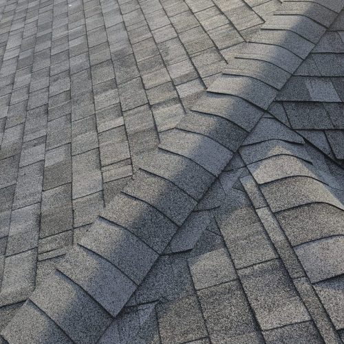 Up close black roof shingles